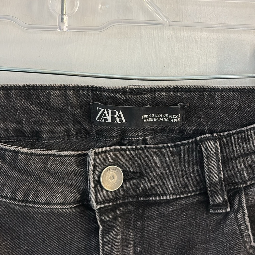 Zara jeans in black.  Frayed zip ankle- so cute